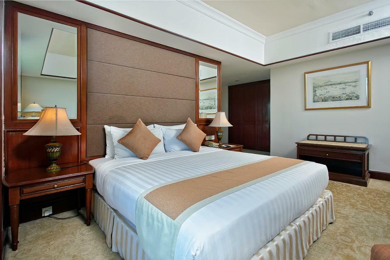 太平洋丝绸酒店 亞庇 外观 照片 A bedroom at the hotel